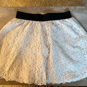Lace cream skirt with wide black waist band size 8